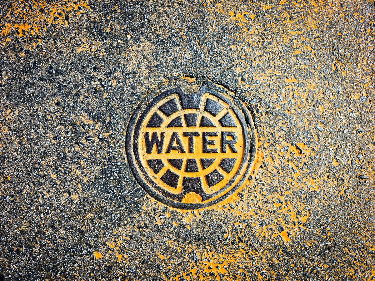 Water system inspection cover labelled WATER